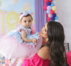 a person holding a baby